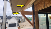 East soffit beam and corbel