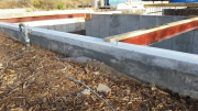 Existing foundation is corrected with structural grout