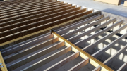 Floor joists dropped for brick floor at entry way