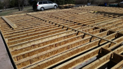 Joists are braced straight before sheathing