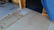 Transition of new floor to old garage