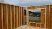 Corner OSB overlaps for air seal and strength