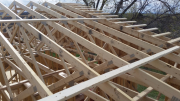 Trusses are braced and aligned before sheathing