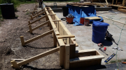 Concrete forms for wall extensions are braced