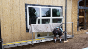 Windows are lifted by scaffold