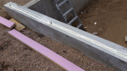 School room plates installed over foam for anti-air infilteration
