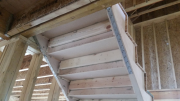 Stairs are hung on metal straps.