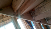 Stairs are bolted in the wall.