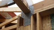 Garage girder hold down.