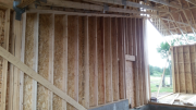 Tall garage rake wall is framed.