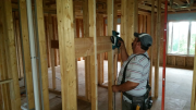 Carlos planed and shimmed studs for straight walls.