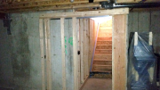 Basement wall for pocket door