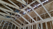 Blocks for insulation in school room ceiling