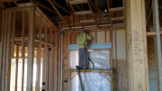 Closed cell foam insulation being installed