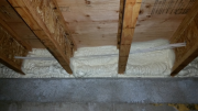 Closed cell foam insulation at rim in basement