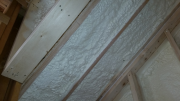 Closed cell foam insulation in full rafter cavities