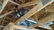Fresh air intake opens with range hood use