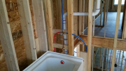 Plumbing above tub