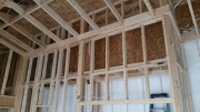 Attic walls are sheathed over insulation
