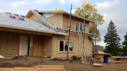 Exterior trim in progress at northeast corner