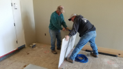 Keith starting underlayment application at brick entry