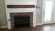 Reclaimed lumber and brick used at fireplace