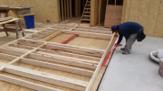 Main 11 ft walls are foamed under plate for air infiltration prevention