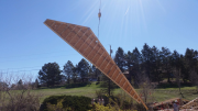 Crane lifts trusses