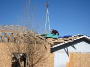 Roof OSB is placed on existing roof