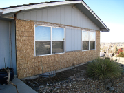 Old stone areas are sheathed with OSB