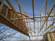 Deck roof trusses and gable are braced