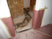 Part of concrete floor in basement bathroom is removed