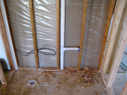 Plumbing started in powder room