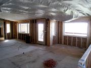 Great room & kitchen with new windows & door
