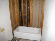 Drywall in hall bath is removed