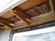Insulation baffles are installed in original attic space