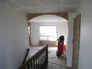 New arch by stairs replaced 2 small ones