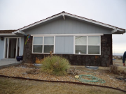 Stone veneer removed at east elevation