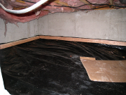Vinyl installed in kitchen nook crawl space