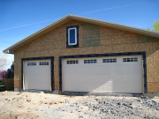 Insulated garage doors are installed