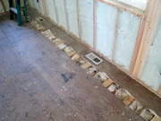 Floor cantilever insulated with 2 in. closed cell, added cellulose & reused batts