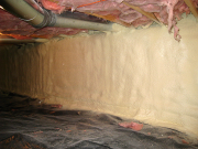 Walls in crawl space are insulated with closed cell foam