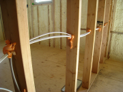 Framing penetrations are sealed tight with foam