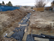 Excavation protected from weather