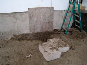 New crawlspace access opening is cut in foundation