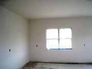Drywall texture in laundry room is complete