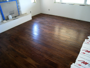 Hardwood floor is finished in living room