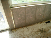 Master bedroom wall insulated with blown fiberglass