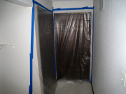Bedroom doors are sealed with plastic