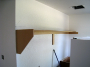 Shelf in laundry above washer & dryer